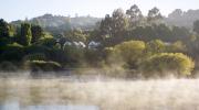 Lake House across the misty lake photo Lisa Cohen2